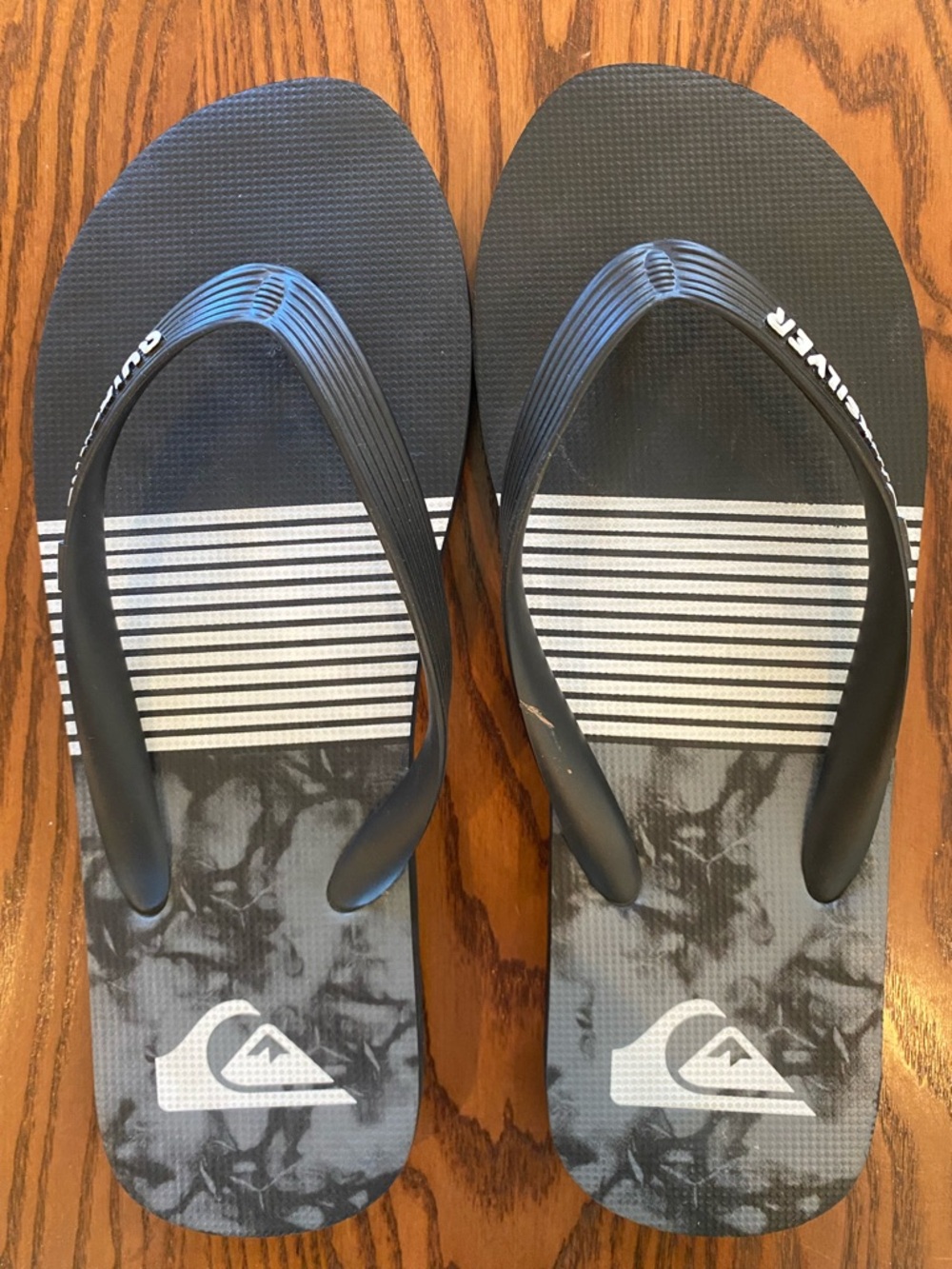 Quiksilver Black and White Striped Logo Flip Flops - Men’s size 10/11